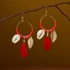 Hot selling ethnic style retro feather earrings, long multi colored vacation feather earrings, bead string design, circular earrings