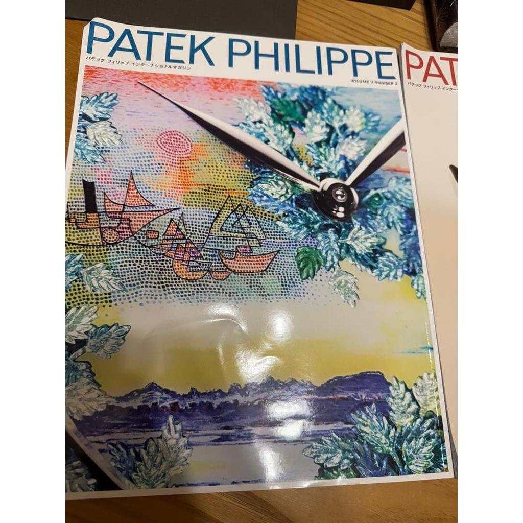 Used Patek Philippe collection book, 2 magazines, and travel case