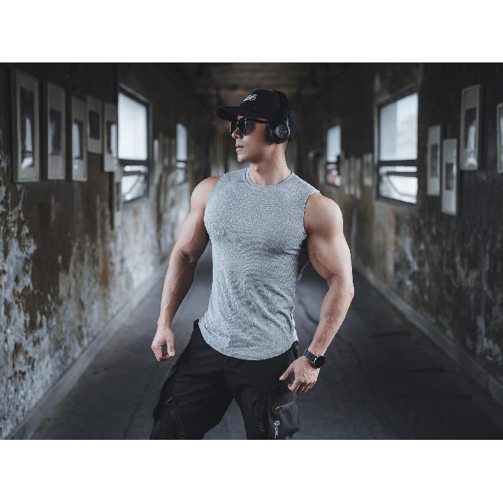 Nová sportovní vesta Pánské volné léto Čistá bavlna Fitness a kulturistika Rychleschnoucí Košile bez rukávů přes rameno Bílá základní košile Tričko bez rukávů