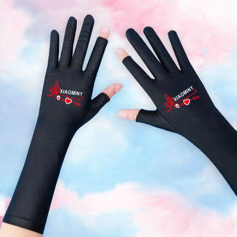 

Lengthened Gloves Women Open Finger Oversleeve Sun Protection Ice Silk Thin Spring and Autumn Breathable Dancing Square Dance Touch Screen Two-Finger 27cm Print 2 fingers [black]]