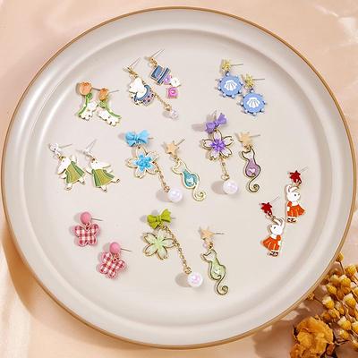 Silver Needle Niedliche Cartoon Quastenohrringe mit Schleife & Blumendesign Popcorn Legierung Ohrringe