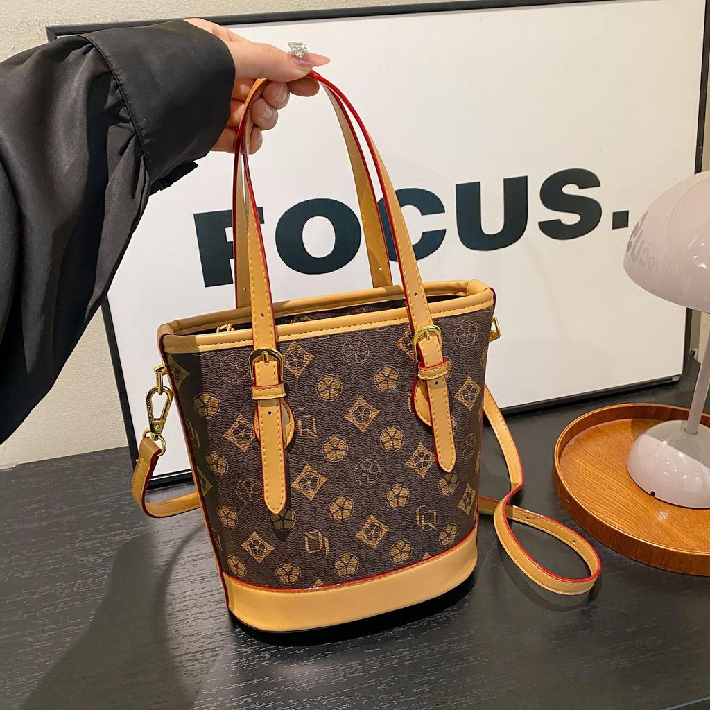 Bucket bag women's new retro simple niche high-end women's handbag diagonal span small women's bag