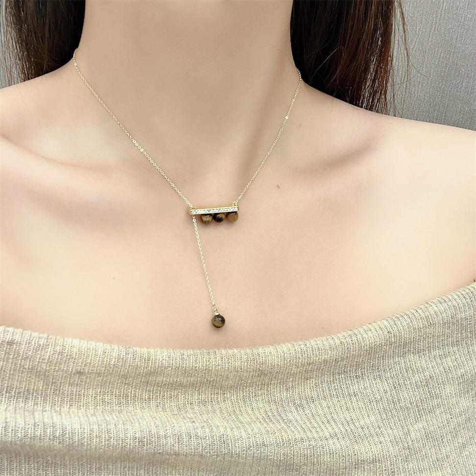 

Ожерелье из циркониевого жемчуга с элегантной кисточкой - простая ретро-модная цепочка на ключицу N1077R Balance Beam Tiger Eye Stone золотой