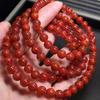 South Red Jiukou Prayer Beads Bracelet: 7mm Lustrous Red Round Beads, Multi-Strand Design.