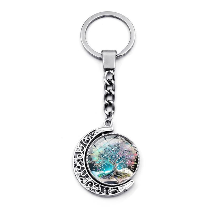 Distinctive Keychain Of With Doublesided Rotating Moon Charm