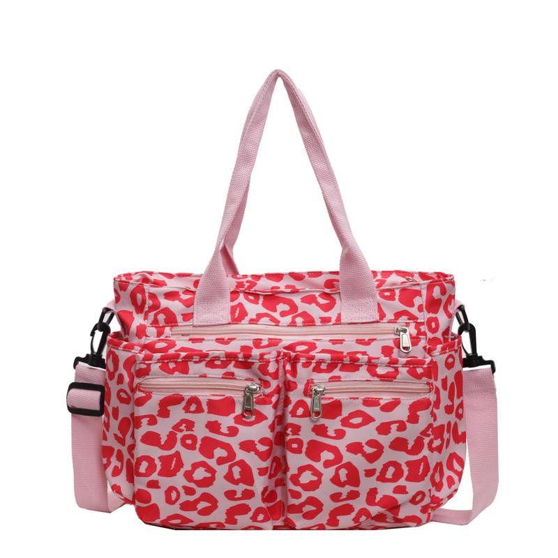 

Classic Leopard Print Large Capacity Leisure Women s Bag with Multiple Pockets New Lightweight Commuting Tote Bag рожевий