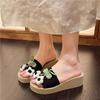 Thick-soled one-word beach shoes for travel wear 2025 summer new comfortable, lightweight and heightening holiday flower slippers