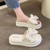 Bow Internet celebrity wearing versatile platform slippers 2025 new fairy style muffin non-slip beach sandals
