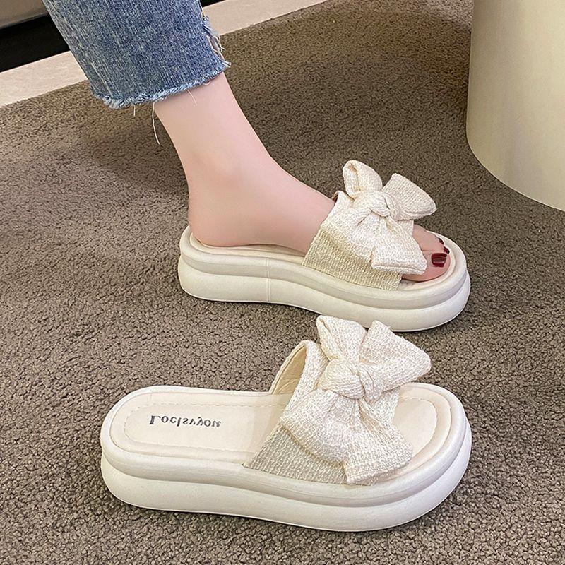Bow Internet celebrity wearing versatile platform slippers 2025 new fairy style muffin non-slip beach sandals