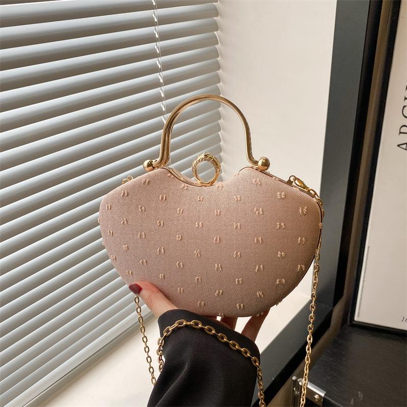 

Summer new product fashion light luxury high texture niche high value portable chain shoulder messenger bag розовый