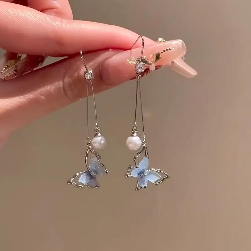 Exquisite, Elegant, and Sophisticated: Light Luxury Purple Imitation Pearl Butterfly Earrings with Fringe синий