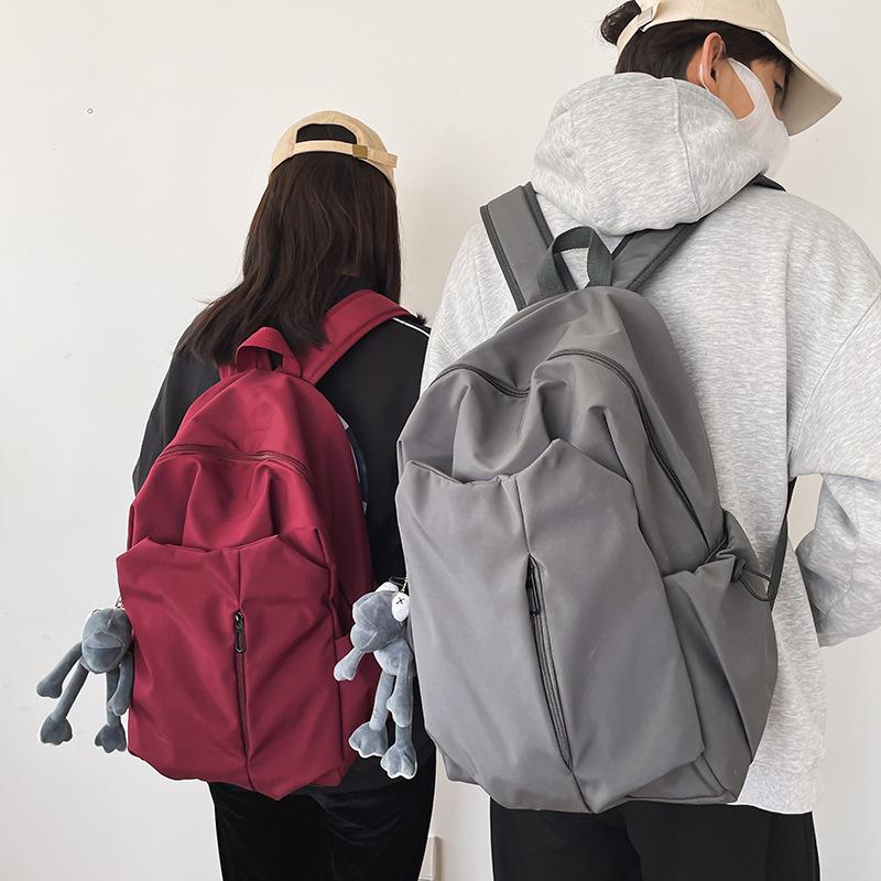 Pánský lehký módní batoh s velkou kapacitou pro vysokoškolské a středoškolské studenty