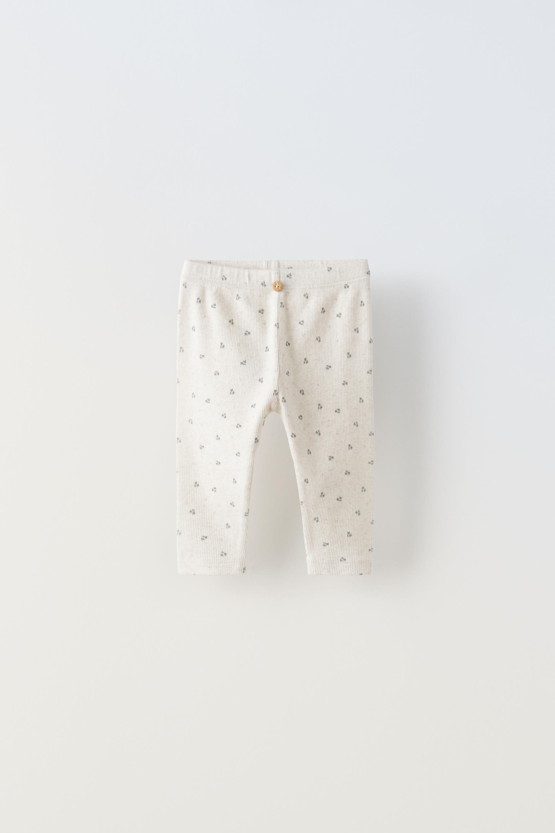 

ЛЕГИНСЫ В РЕБРИКУ С ПРИНТОМ ЛИСТЕЙ