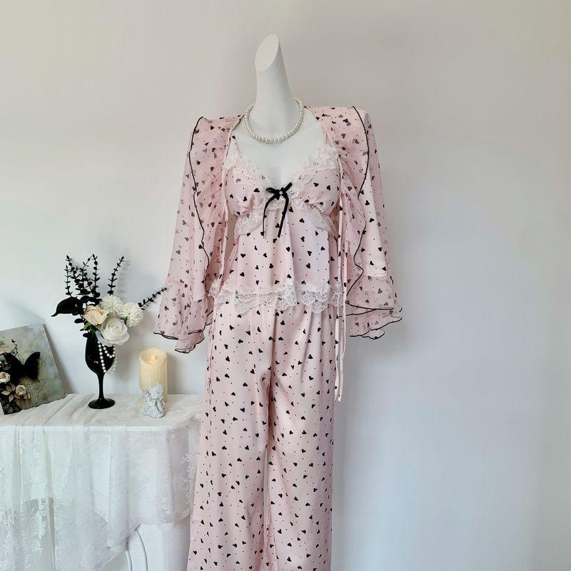 

Jiao Jiao Beauty Pure Desire Ice Silk Three-Piece Suit Pink Sling Pajamas With Chest Pad Sweet Can Be Worn outside Homewear Pink (sling + pants + Cardigan) XL