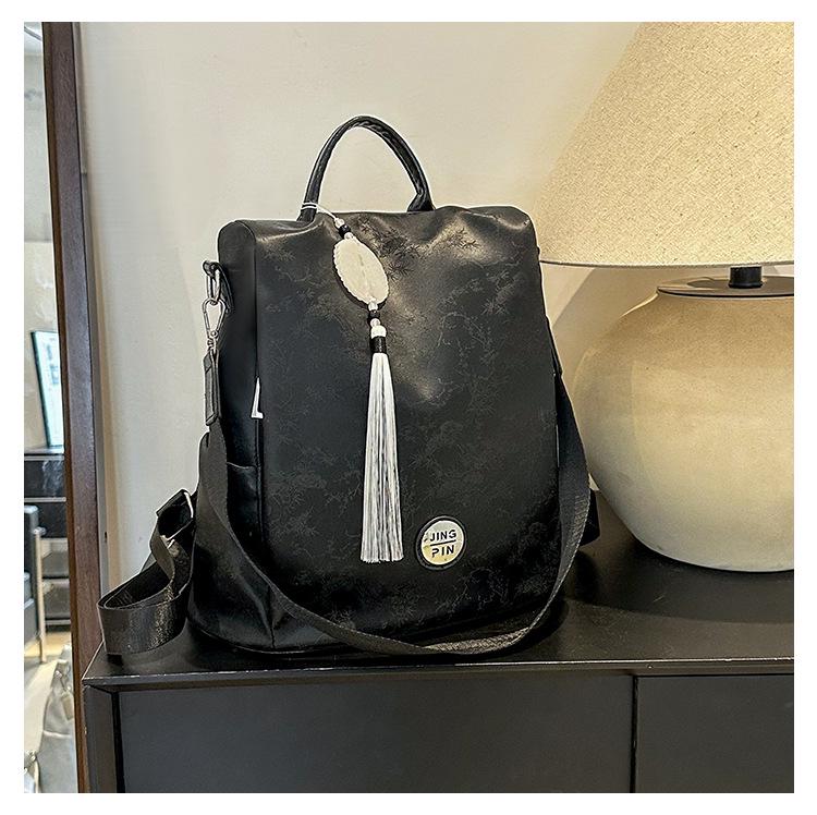 

Chic Women s Tassel Backpack - Versatile, Fashionable & Compact for Travel чорний