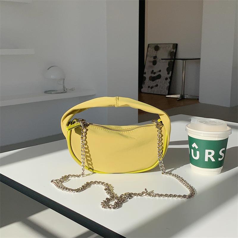 

Spring and summer casual nylon handbag fashionable versatile dumpling chain bag women s high-end sense niche messenger mobile phone bag women жёлтый