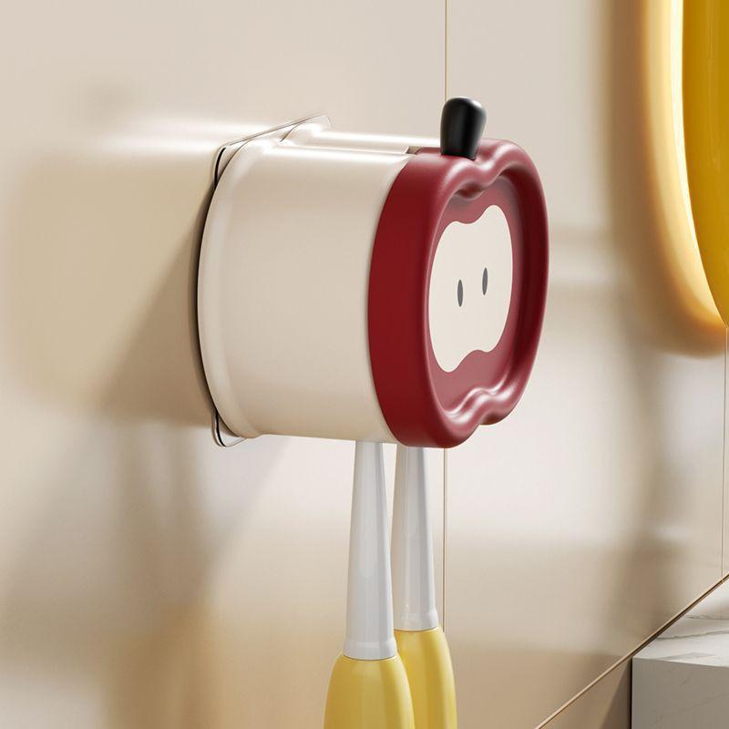 2PCS Drill-free cartoon apple toothbrush cup & holder set – wall-mounted, dust-proof bathroom storage organizer for the home.