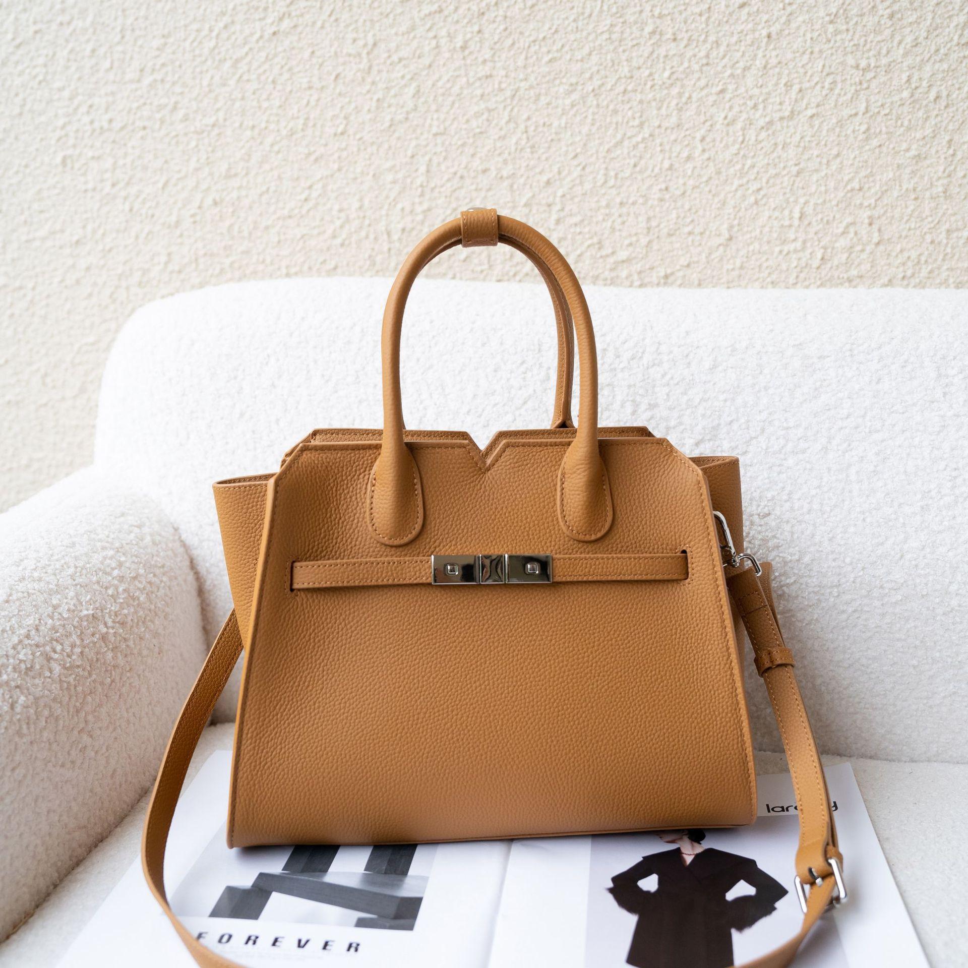 

First layer cowhide light luxury bag women s bag handbag bag simple shell bag large bag platinum wing bag 30*12*24cm коричневый