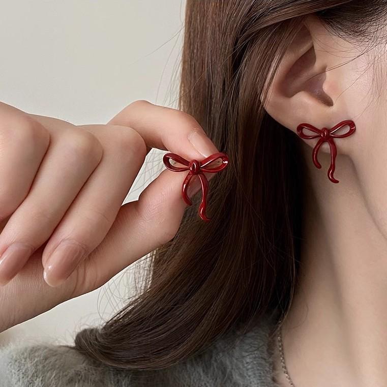 Hong Kong Ankara Red Bow Stud Earrings: Retro, Versatile, and Luxurious Accessory for a Niche Fashion Statement.