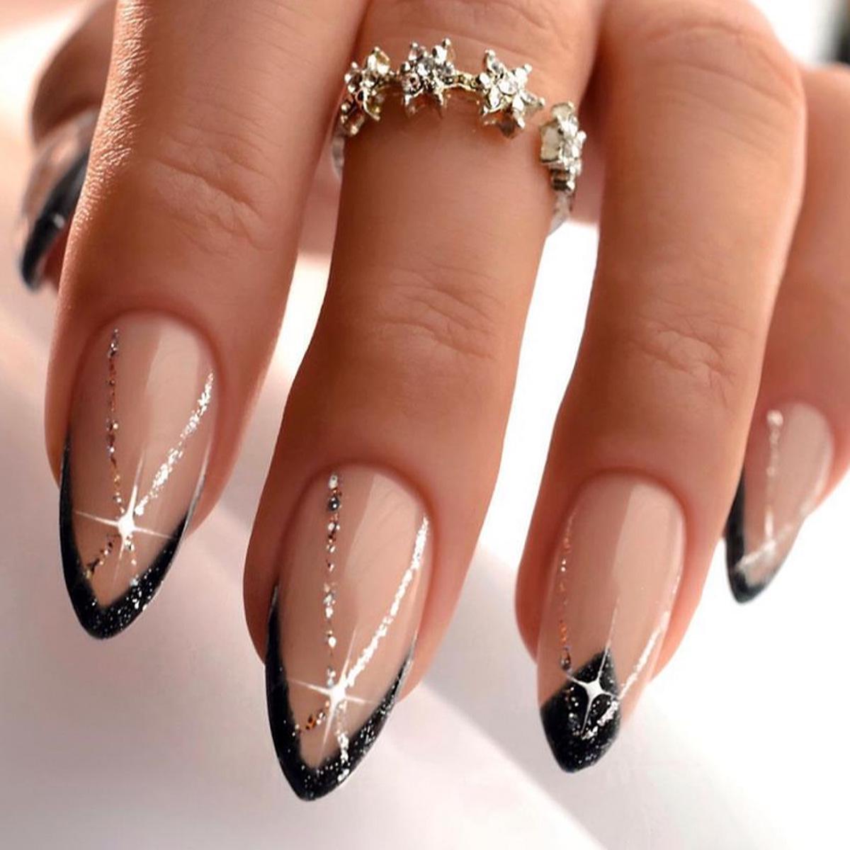 

Almond-Shaped Wearable French Nails: Gold Lines & Stars Design