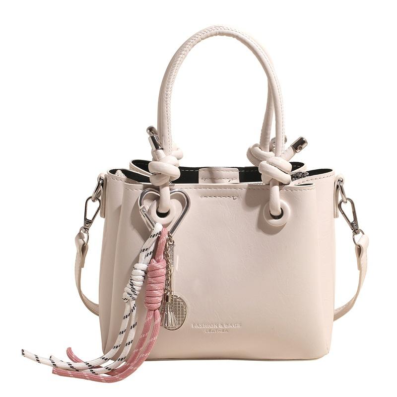 This year's popular retro portable bucket bag, fashionable versatile oil wax leather, high-end commuter messenger women's bag