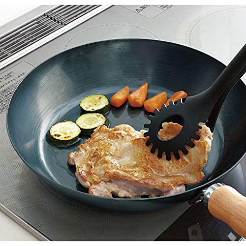 This 24cm iron skillet with a plain wood handle is made in Japan and is suitable for induction cooktops. It's lightweight and requires no seasoning. P
