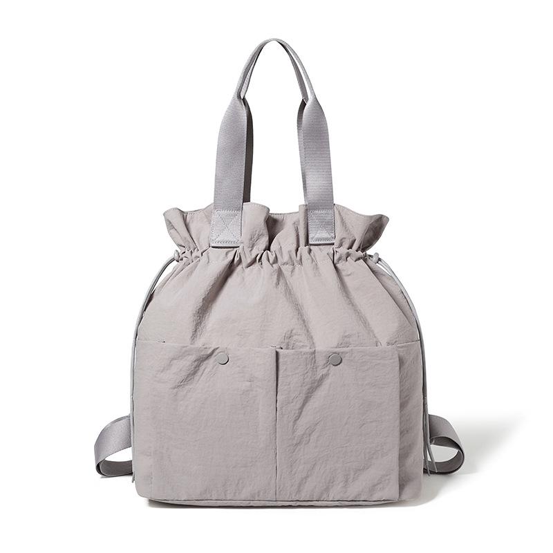

Нейлоновый рюкзак женский большой вместимости многофункциональная сумка через плечо светло-серый