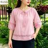 Blouse ample décontractée pour femmes à col rond et manches 3/4 de couleur unie
