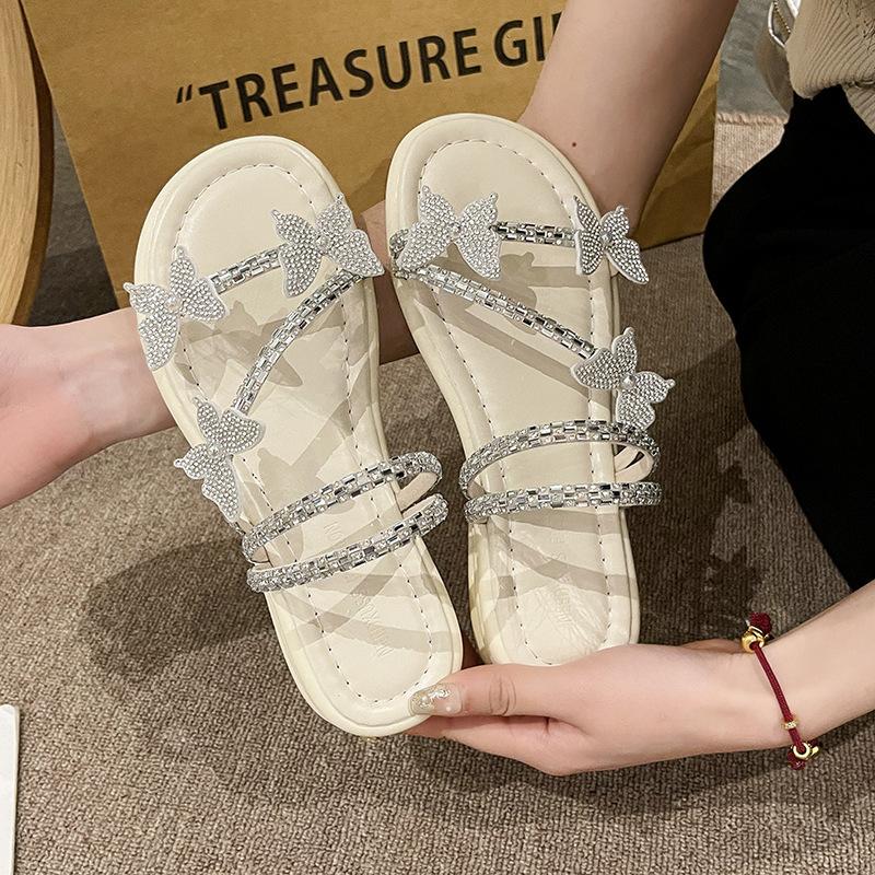 

Beach slippers spring flip-flops new bow diamond sandals female summer flat bottom feng shui fairy fashion with skirt 35 бежевий