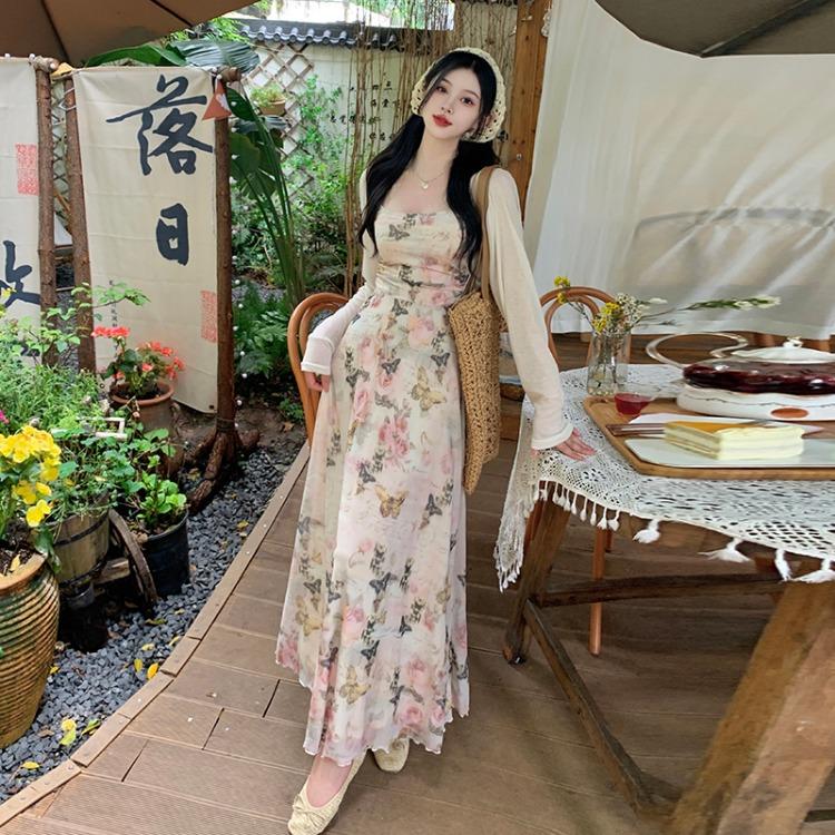 Chic and Feminine Sleeveless Maxi Dress with Floral Print and Waist Cinching