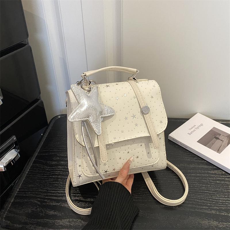 Schoolbag simple star backpack women's 1011 new fashion foreign style handbag casual about foreign style small schoolbag