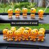 Car interior decoration decoration funny doll shaking head emoticons beautiful Internet red little idea