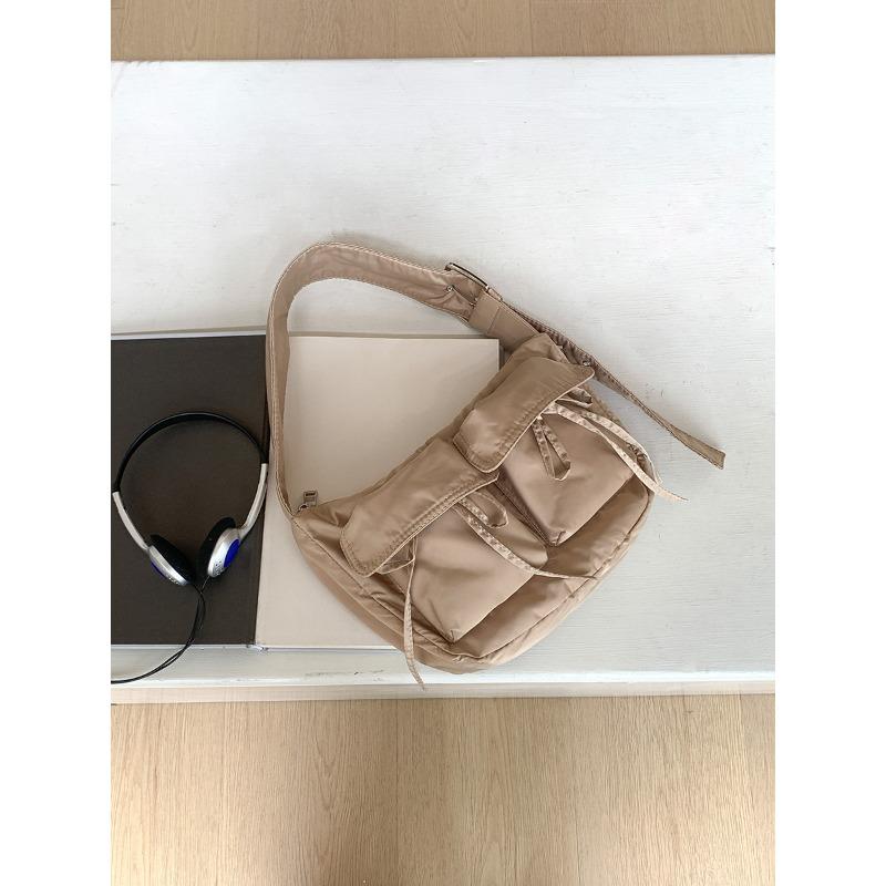 

Portable large-capacity bag women s casual bow nylon dumpling bag women s wide shoulder strap new shoulder bag women абрикосовий