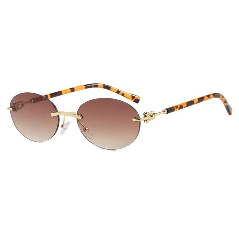 Unisex Light Luxury Advanced Oval Frameless Cut Edge Sunglasses Ultra Light Fashion Stage Performances Uv Resistant Glasses