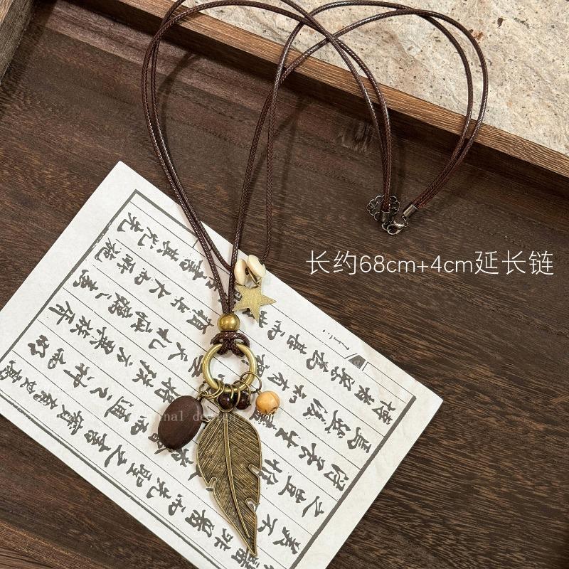 Bohemian wood beads beaded hollow round pendant necklace light luxury high-end sweater chain niche necklace accessories