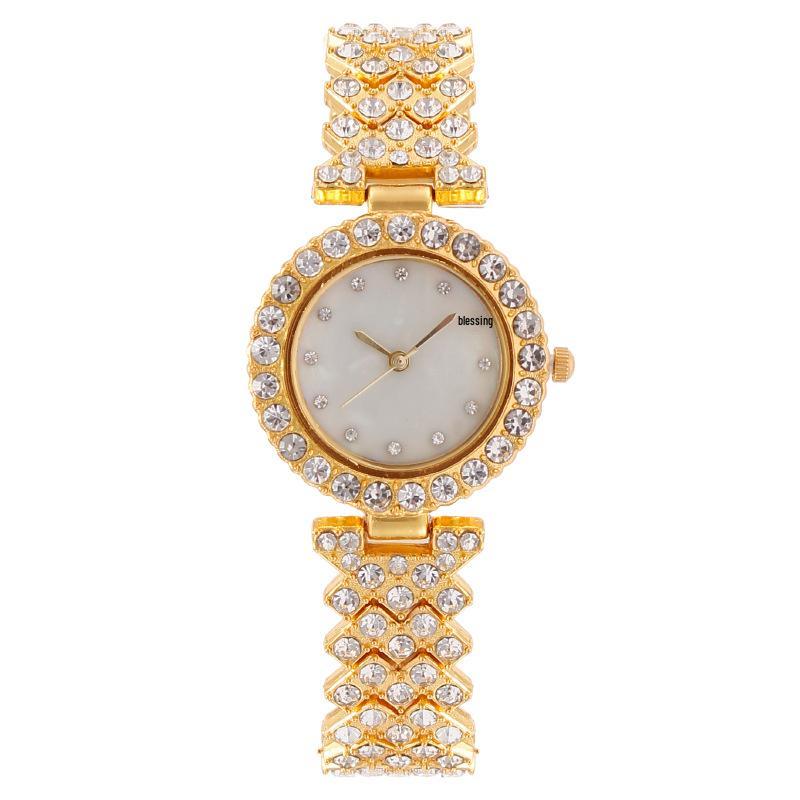 

Модний жіночий браслет-годинник з циферблатом у вигляді раковини, повністю інкрустований діамантами золотий