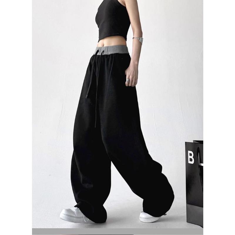

Contrasting sports scimitar pants, high-end lazy style loose color matching sickle pants, small high-waisted and thin casual pants S чорний