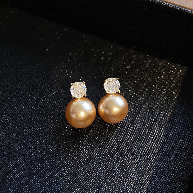 

Серьги принцессы Дианы из стерлингового серебра с жемчугом и цирконием для женщин (Тенденция 2024 года) 10mm шампанского