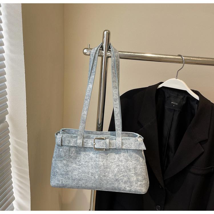 

Korean version of retro commuter bag women s 2025 new high-end niche single shoulder armpit bag fashion design hand bag