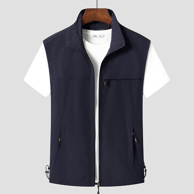 

New Minimalist Trendy Men s Summer Solid Color Lapel Shoulder Outdoor Leisure Loose Pocket Work Vest Sleeveless Jacket 5XL темно-синього кольору