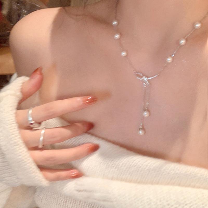 Spice Girl Bow Necklace Women's Versatile Premium Sense Niche Tassel Temperament Simple Pearl Clavicle Chain Jewelry