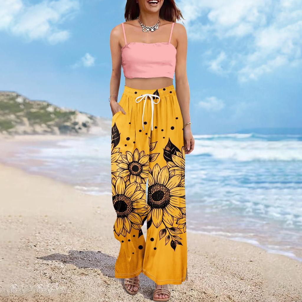 Pantaloni palazzo estivi da donna, stile boho, a vita alta, larghi, con stampa floreale e tasche.