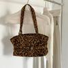 Vintage commuter leopard print bag belt decoration new tote bag large capacity niche locomotive Spice girl portable shoulder bag