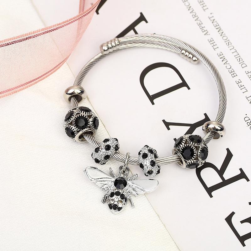 Bracelet réglable en argent et or avec diamants brillants et abeille