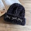 Knitted Winter Hat For Women With Plush Material And High Top Design For Cold Weather Comfort