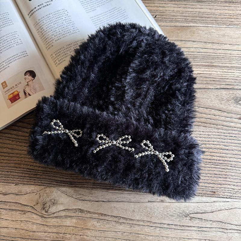 Knitted Winter Hat For Women With Plush Material And High Top Design For Cold Weather Comfort