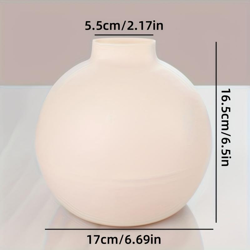A Round Plastic Tissue Box Tissue DispenserSuitable for KitchensLiving Room and OfficesFeaturing A Nordic Style Tissue Holder
