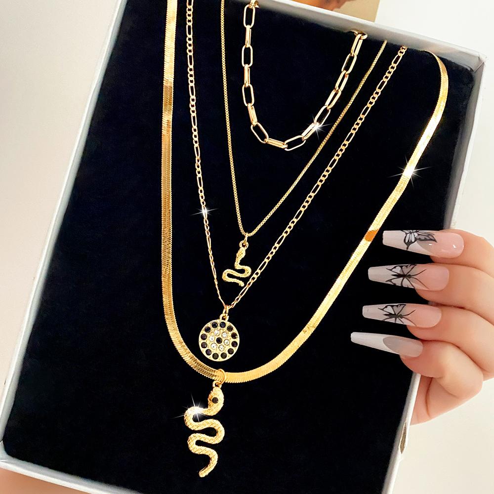 Four Piece Snake Necklace Women's Fashion Hollow Out Necklace Personality Bohemian Sweater Chain Elegant Snake Pendant