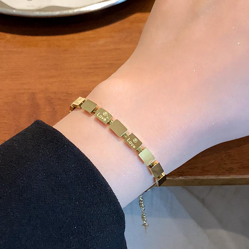 

Women s Gold Small Square Beaded Titanium & Stainless Steel Bracelet
