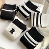 5 Pairs of Black and White Women's Mid Length Socks
